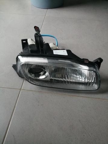 Goede koplamp MAZDA 323f type BA  1994/1999 (bijrijderskant) beschikbaar voor biedingen