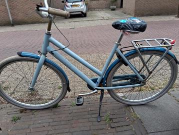Fiets lichtblauw president beschikbaar voor biedingen