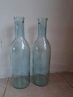 2 grote glazen flessen €30,-, Glas, Ophalen