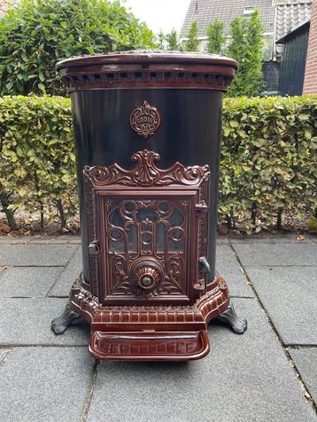 Prachtige majolica bruine Godin houtkachel kolen 7KW ZGAN!! beschikbaar voor biedingen