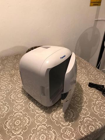 Mini Koeler en Verwarmer beschikbaar voor biedingen