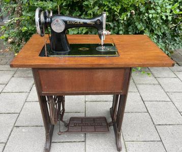 Antieke Singer naaimachine beschikbaar voor biedingen