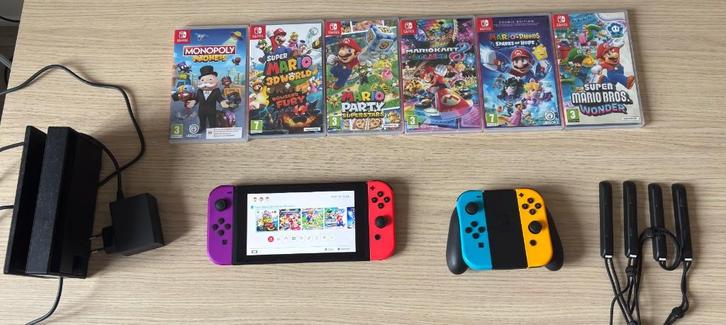 Nintendo Switch + games, Spelcomputers en Games, Spelcomputers | Nintendo Switch, Zo goed als nieuw, Switch 2019 Upgrade, Met 3 controllers of meer