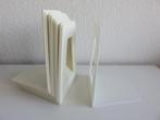 10 witte creme kunststof boekensteunen, Ophalen of Verzenden, Gebruikt