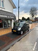 Daihatsu Cuore 1.0 5Deurs AIRCO, zwart metallic lak, Voorwielaandrijving, 600 kg, Zwart, 4 stoelen