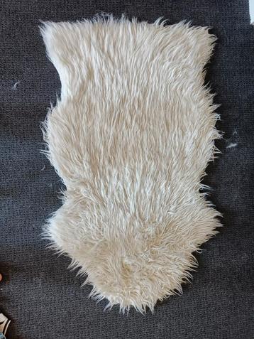 Schapenkleedje beschikbaar voor biedingen