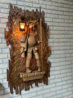 Houten man met lantaarn op koperen plaat, Ophalen, Koper