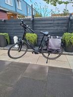 te koop mooie electric heren/dames fiets freammaat 57 cm, Ophalen, Gebruikt, Batavus, 50 km per accu of meer