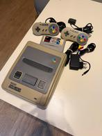Super nintendo met 2 controller en mario all stars, Spelcomputers en Games, Spelcomputers | Nintendo Super NES, Ophalen of Verzenden