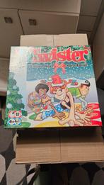 Twister Kerst Editie - Leuk voor de feestdagen!, Hobby en Vrije tijd, Gezelschapsspellen | Bordspellen, Vijf spelers of meer, Ophalen of Verzenden