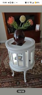 Ronde thee tafel, Ophalen