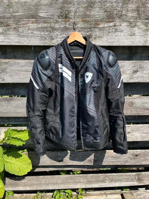 Rev’it! Apex H2O maat 40 + rugprotector - rev it rev'it, Motoren, Kleding | Motorkleding, Jas | textiel, Tweedehands, Ophalen of Verzenden