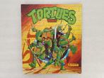 Panini: stickeralbum Tortues Ninja (Panini, Mirage, 1990), Ophalen of Verzenden, Gebruikt, Film, Tv of Omroep