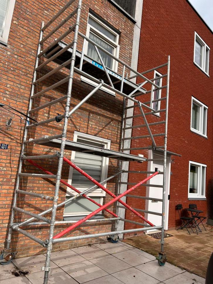 Steiger verhuur Denhaag/Rotterdam, Doe-het-zelf en Verbouw, Steigers, Zo goed als nieuw, Rolsteiger of Kamersteiger, 5 meter of hoger