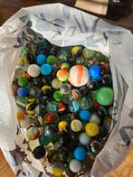 Zak met knikkers, Ophalen