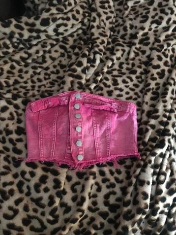 Roze denim topje beschikbaar voor biedingen