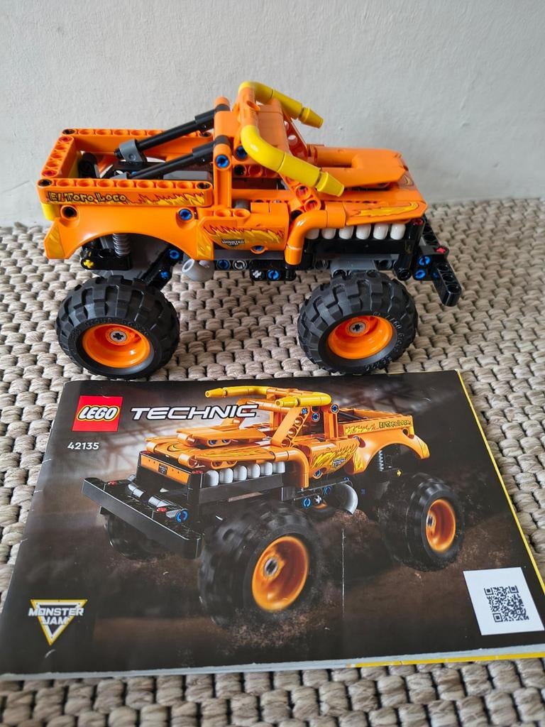 Oranje lego technic  monstertruck (el toro loco), Ophalen, Zo goed als nieuw, Auto, Overige merken