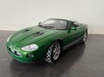 Jaguar XKR uit de James Bond film, Hobby en Vrije tijd, Modelauto's | 1:18, Ophalen of Verzenden, Zo goed als nieuw, Overige merken