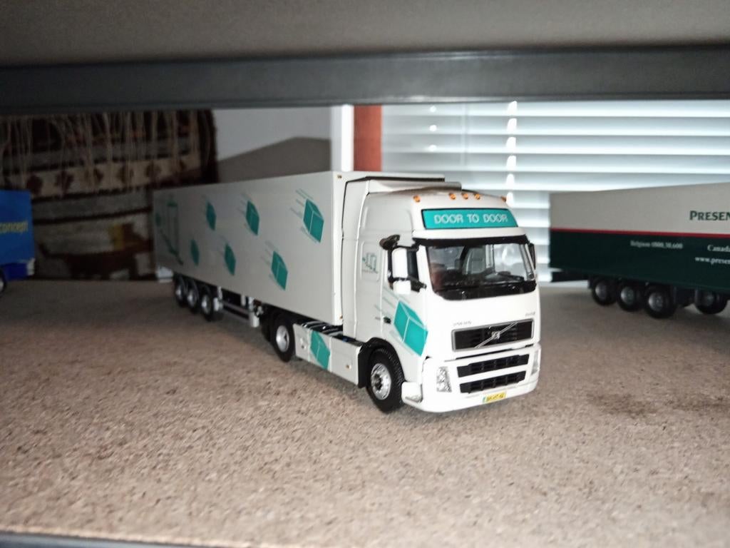 Volvo FH koeloplegger Door To Door WSI, Hobby en Vrije tijd, Modelauto's | 1:50, Wsi, Wsi, Nieuw, Ophalen of Verzenden