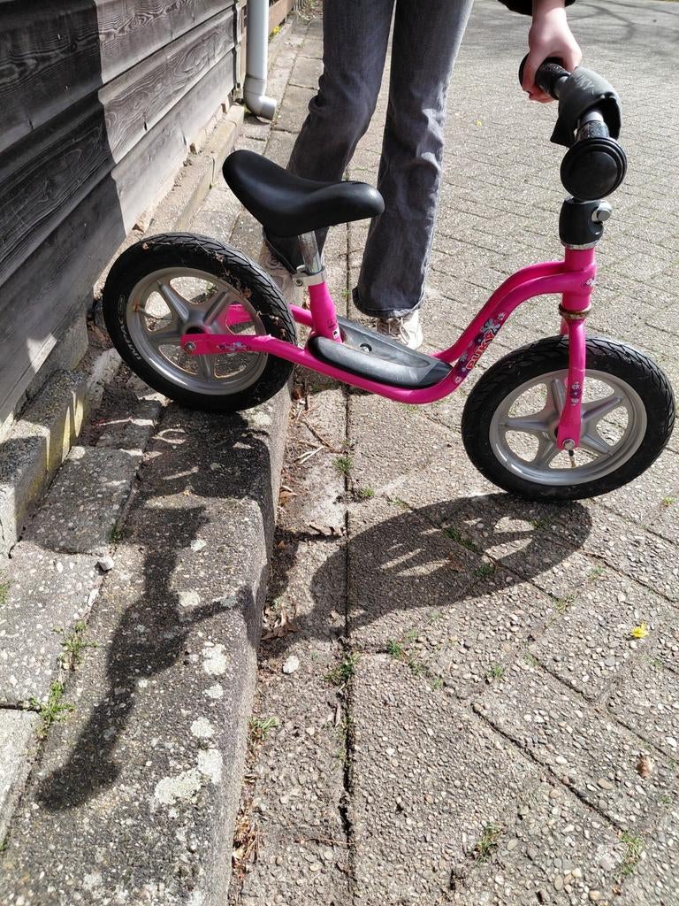 Roze loopfiets - Goede staat, klaar voor een nieuw avontuur!, Kinderen en Baby's, Speelgoed | Buiten | Voertuigen en Loopfietsen