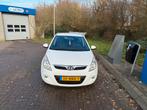 Hyundai i20 1.2 5-DRS 2010 Wit, Auto's, 4 cilinders, Wit, Origineel Nederlands, Handgeschakeld