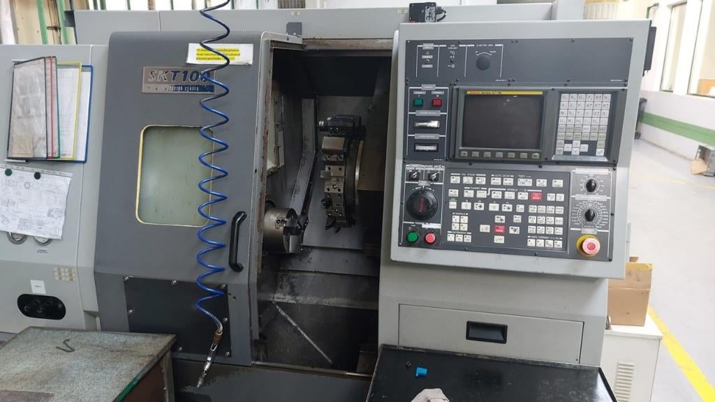 CNC lathe KIA SKT 100, Ophalen, Gebruikt, Gereedschap of Toebehoren