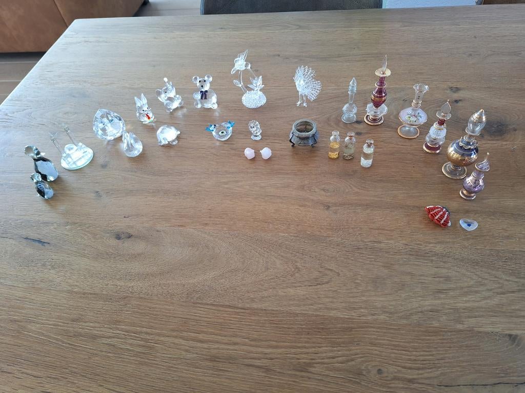Verzameling van kristallen beeldjes en miniatuurflesjes, Verzamelen, Ophalen of Verzenden, Gebruikt, Figuurtje