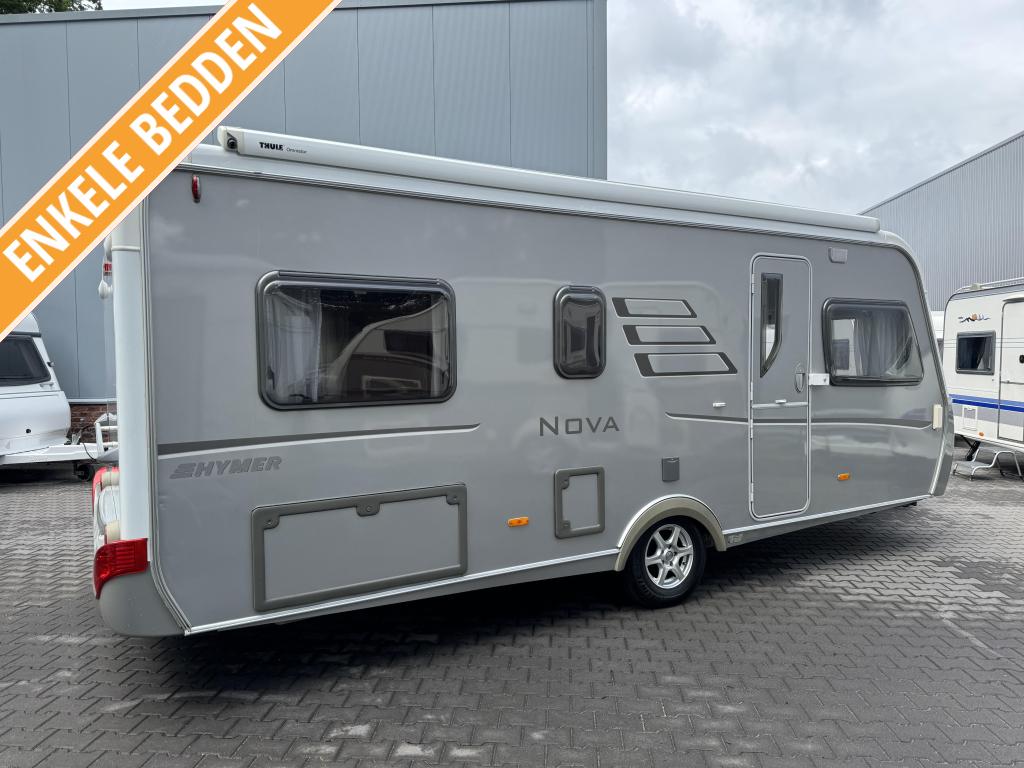 Eriba Nova 530 E / enkele bedden / cassette luifel, Caravans en Kamperen, Rondzit, Bedrijf, Schokbreker, 5 tot 6 meter