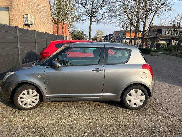 €1500 - Suzuki Swift 1.3 3D 2007 Grijs, Auto's, Suzuki, Particulier, Swift, Airconditioning, Elektrische ramen, Radio, Benzine
