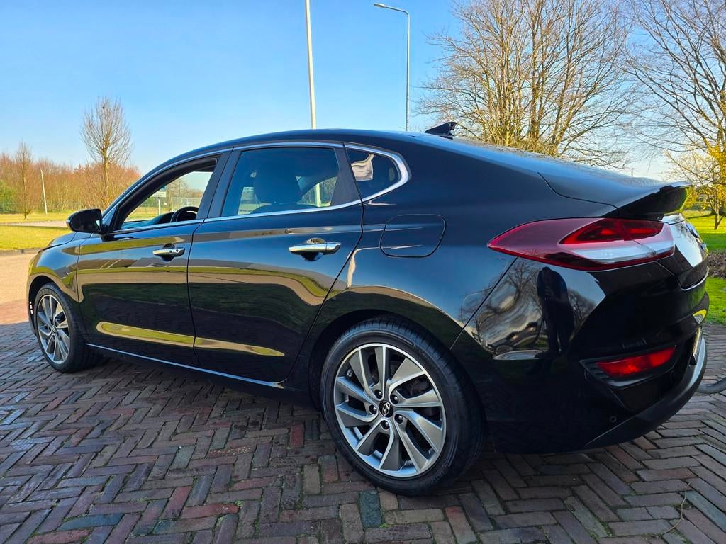 Hyundai I30 Fastback 1.4 T-GDI Premium NAVI/airco/TREKHAAK, Voorwielaandrijving, Euro 6, 4 cilinders, Lichtsensor