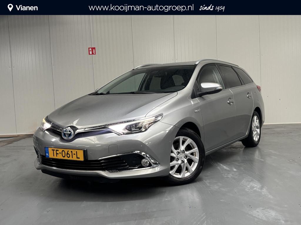 Toyota Auris Touring Sports 1.8 Hybrid Executive, Auto's, Toyota, Gebruikt, Origineel Nederlands, Hybride Elektrisch/Benzine, Te koop