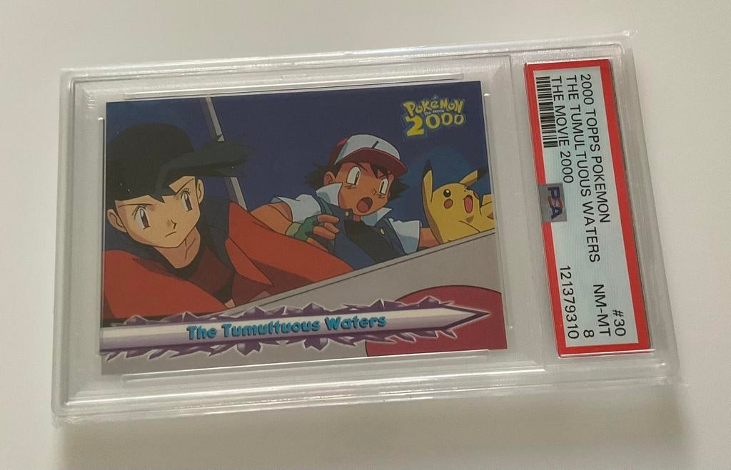 2000 TOPPS POKEMON THE MOVIE 2000 - PSA 8, Ophalen, Zo goed als nieuw, Losse kaart
