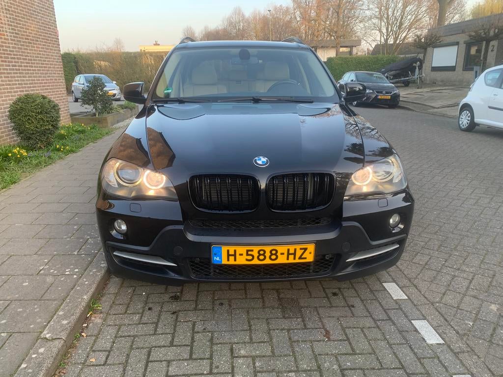 BMW X5 4.8 I v8 355pk x Drive AUT 2007 183923km Full/options, Auto's, Lichtsensor, 138 €/maand, Zwart, Leder