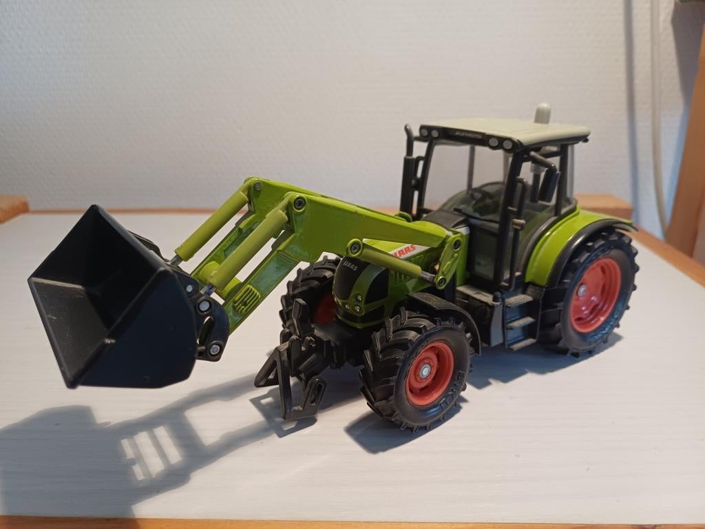 Britains Siku Claas Ares 697 met voorlader, Ophalen of Verzenden, Zo goed als nieuw, Tractor of Landbouw, Britains