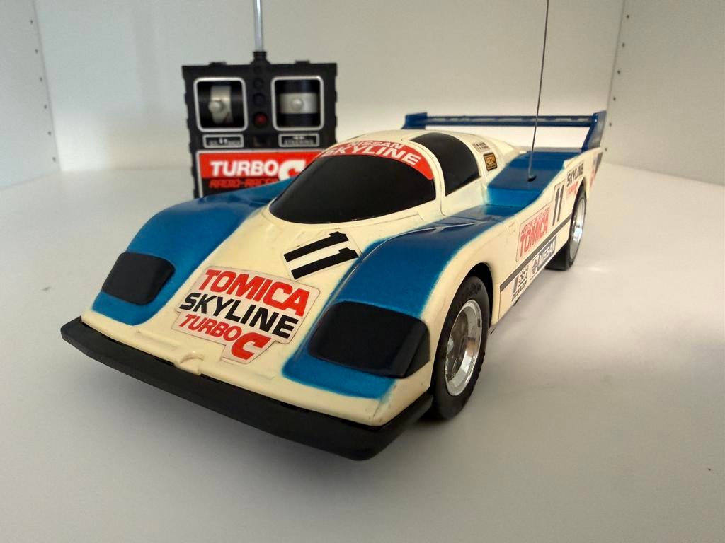 Tomy Nissan Skyline racewagen Japan jaren 80, Ophalen of Verzenden, Zo goed als nieuw, Auto onroad, RTR (Ready to Run)