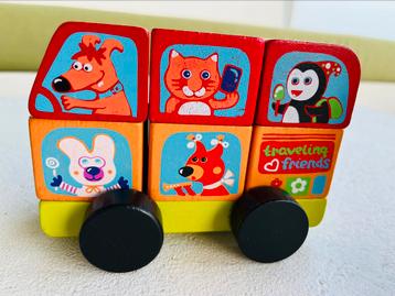 Houten puzzel in de vorm van een bus met dieren beschikbaar voor biedingen