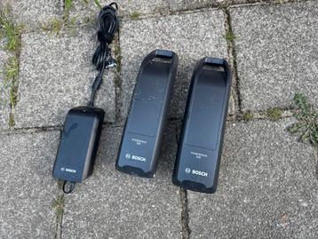 2x Bosch PowerPack 500 accus + oplader – gebruikte staat beschikbaar voor biedingen
