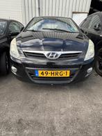 Voorbumper zwart Hyundai i20 I ('08-'14), Auto-onderdelen, Carrosserie en Plaatwerk, Gebruikt, Voor, Ophalen of Verzenden, Hyundai