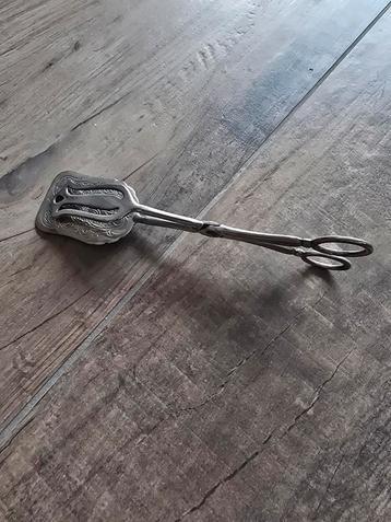 Silverplate cake tang beschikbaar voor biedingen