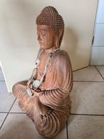 Suarahouten beeld  de vlam boedha, Ophalen