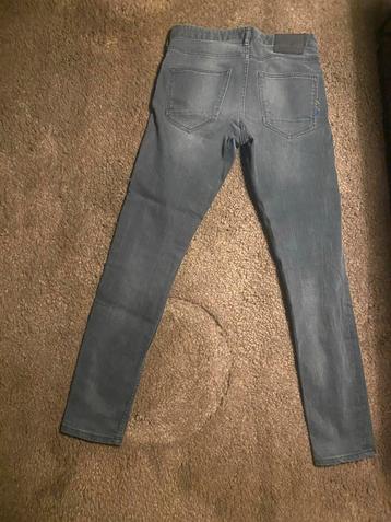 Nieuwe Spijkerbroek 27/30 beschikbaar voor biedingen