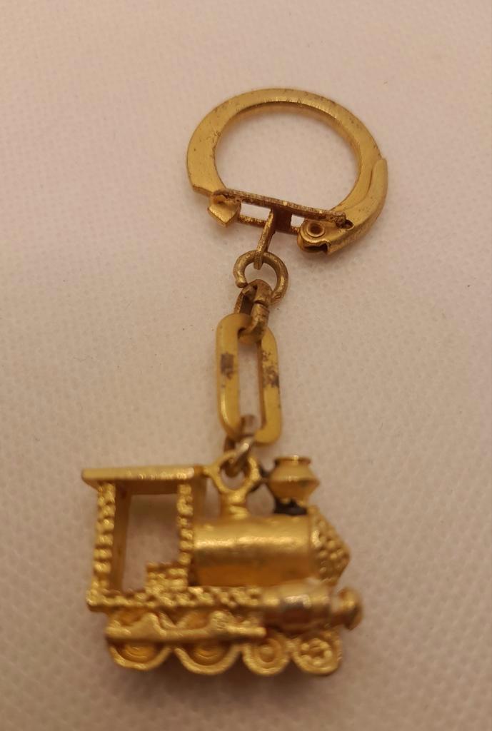 Mooie oude jaren 60 sleutelhanger trein locomotief, Verzamelen, Sleutelhangers, Zo goed als nieuw, Merk, Ophalen of Verzenden