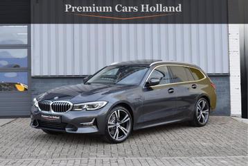 BMW 3 Serie Touring 330e xDrive 292 Pk Pano Navi Keyless Vol beschikbaar voor biedingen