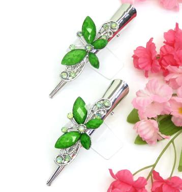 2 Duckklemmen met mooie groene strass stenen vlinders. beschikbaar voor biedingen