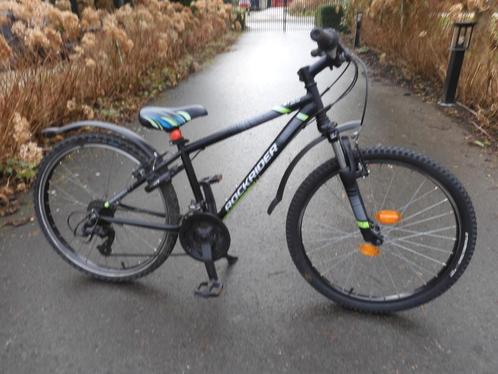 Mooie 24"B'Twin  mountainbike met 21 versnellingen, Fietsen en Brommers, Fietsen | Jongens, Zo goed als nieuw, 24 inch, Handrem