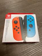 Nintendo Switch Joy-Con - Neon Rood/Blauw - Nieuw, Overige genres, Eén computer, Ophalen of Verzenden, Vanaf 7 jaar