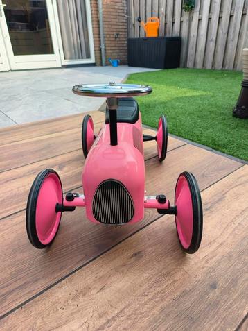 Roze loopauto in Goede Staat beschikbaar voor biedingen