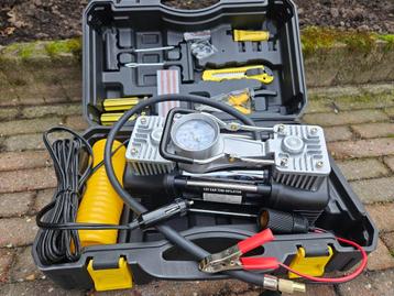 compressor 12 volt in koffer met bandenreparatie set € 37,50 beschikbaar voor biedingen