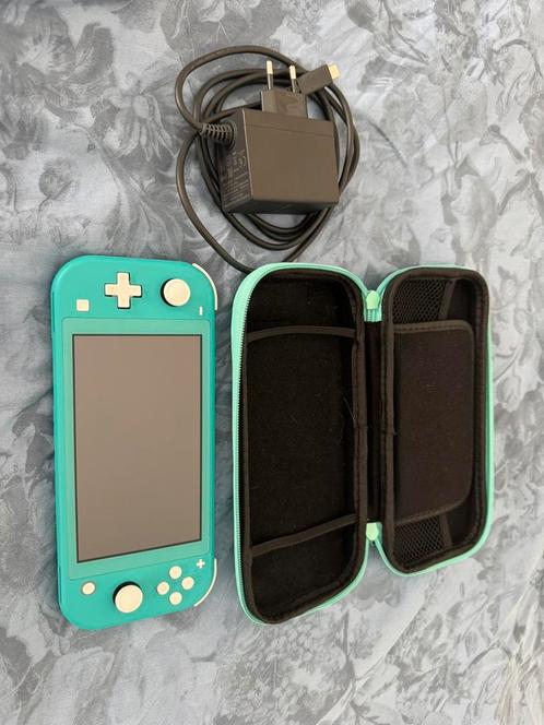 Nintendo Switch Lite Turquoise, Spelcomputers en Games, Spelcomputers | Nintendo Switch Lite, Zo goed als nieuw, Turquoise, Met beschermhoes of tas