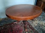 Antieke ronde tafel met sierlijke poten, Ophalen